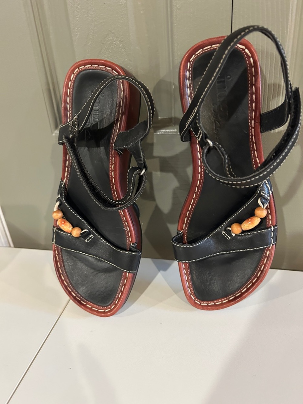Indigo by Clark's Women's Black Leather Upper Sandals with Bead Detail